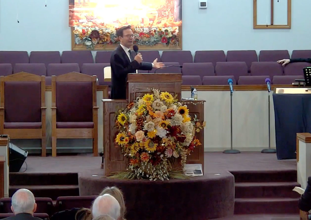 Calvin Hicks preaching.