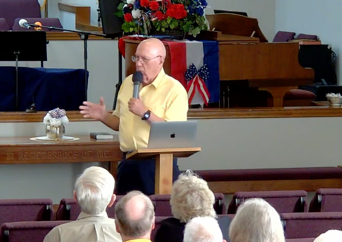 Joe Mercer preaching.