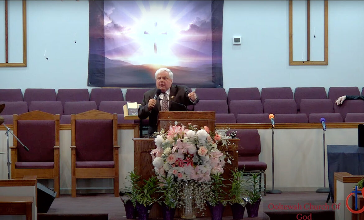 Willard Griffin preaching.