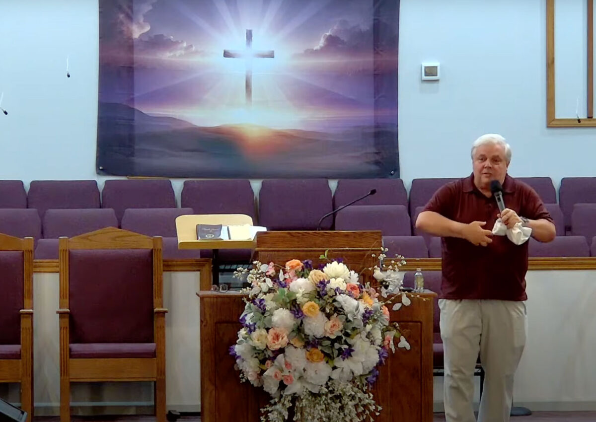 Willard Griffin preaching.