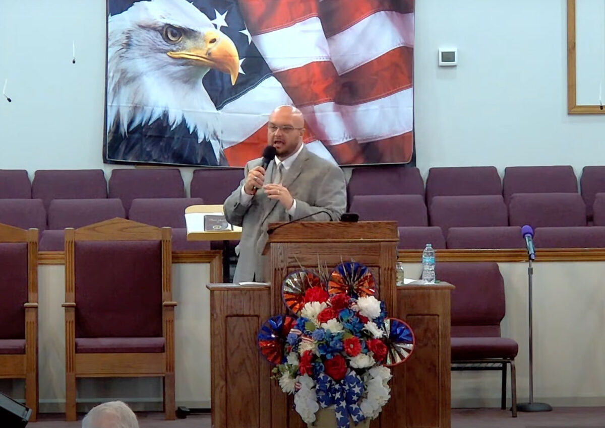Scotty Haggar preaching.