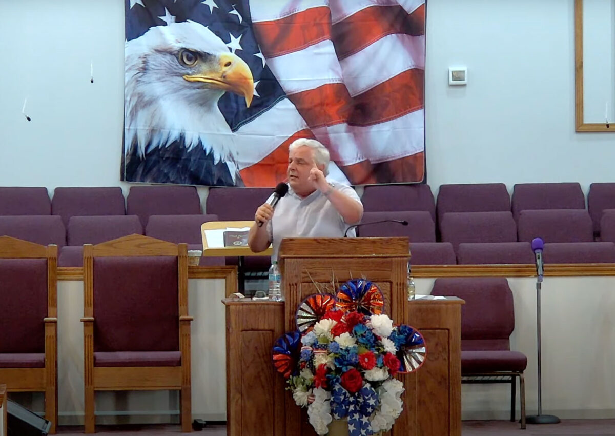 Willard Griffin preaching.