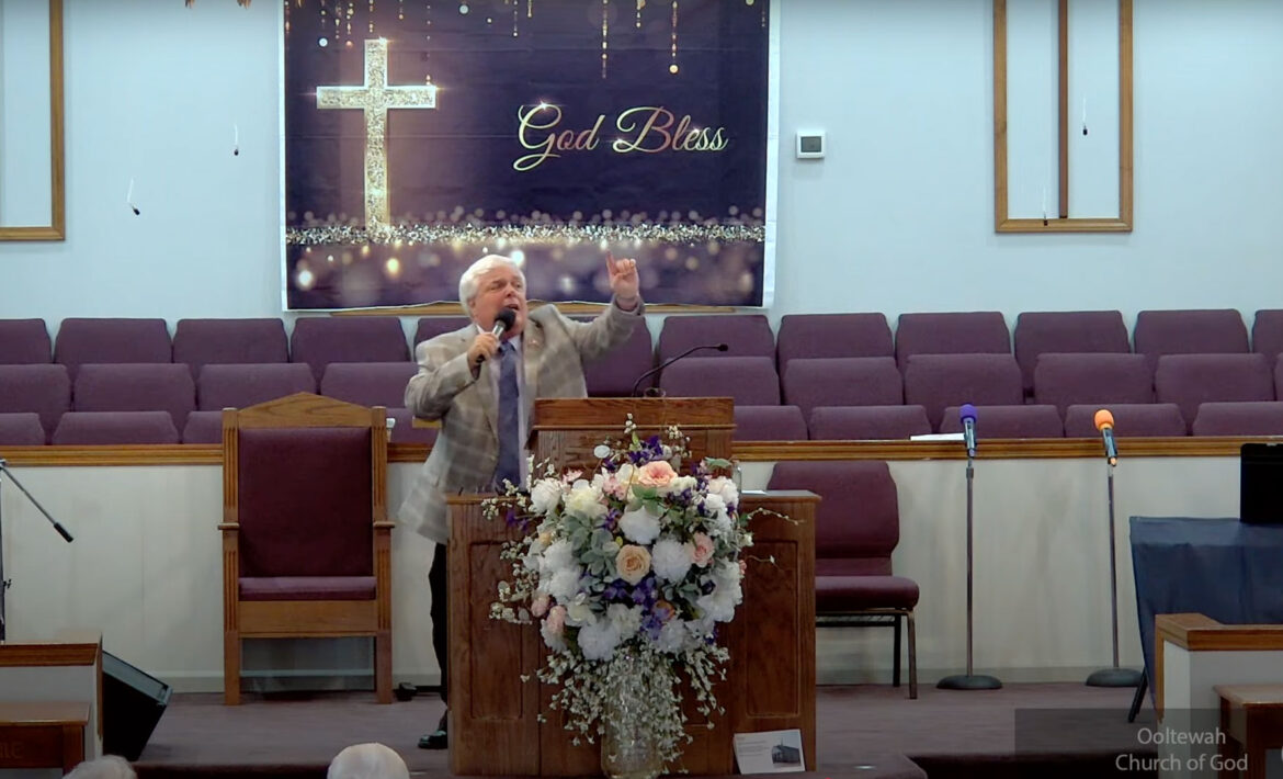 Willard Griffin preaching.