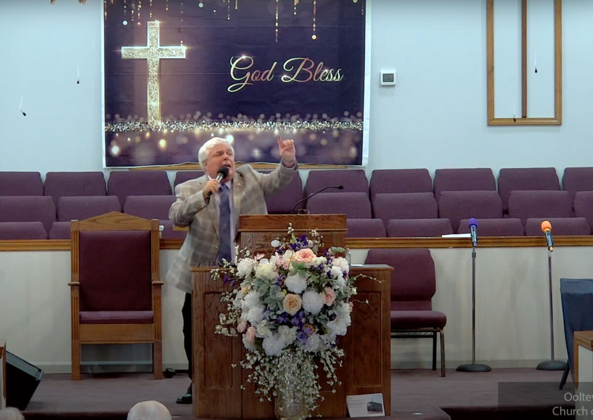 Willard Griffin preaching.