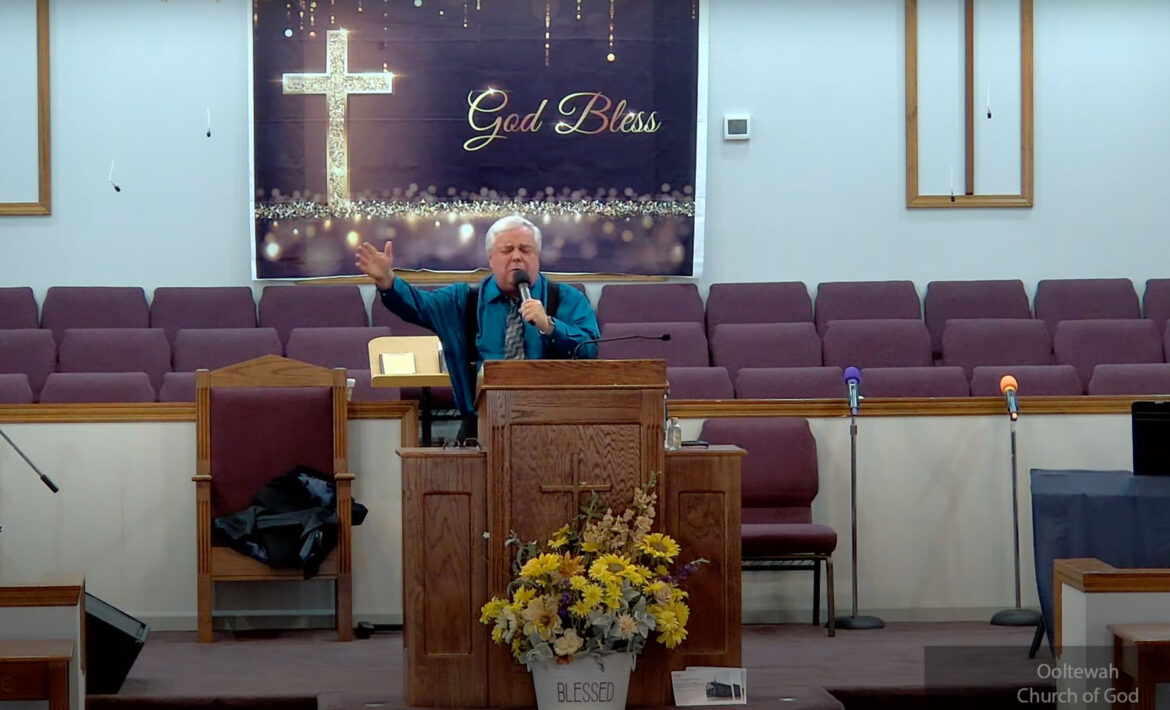 Willard Griffin preaching.