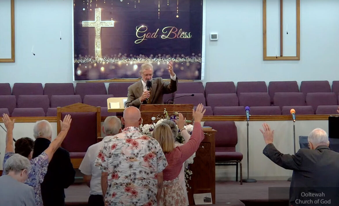 Darrell Bewley preaching.