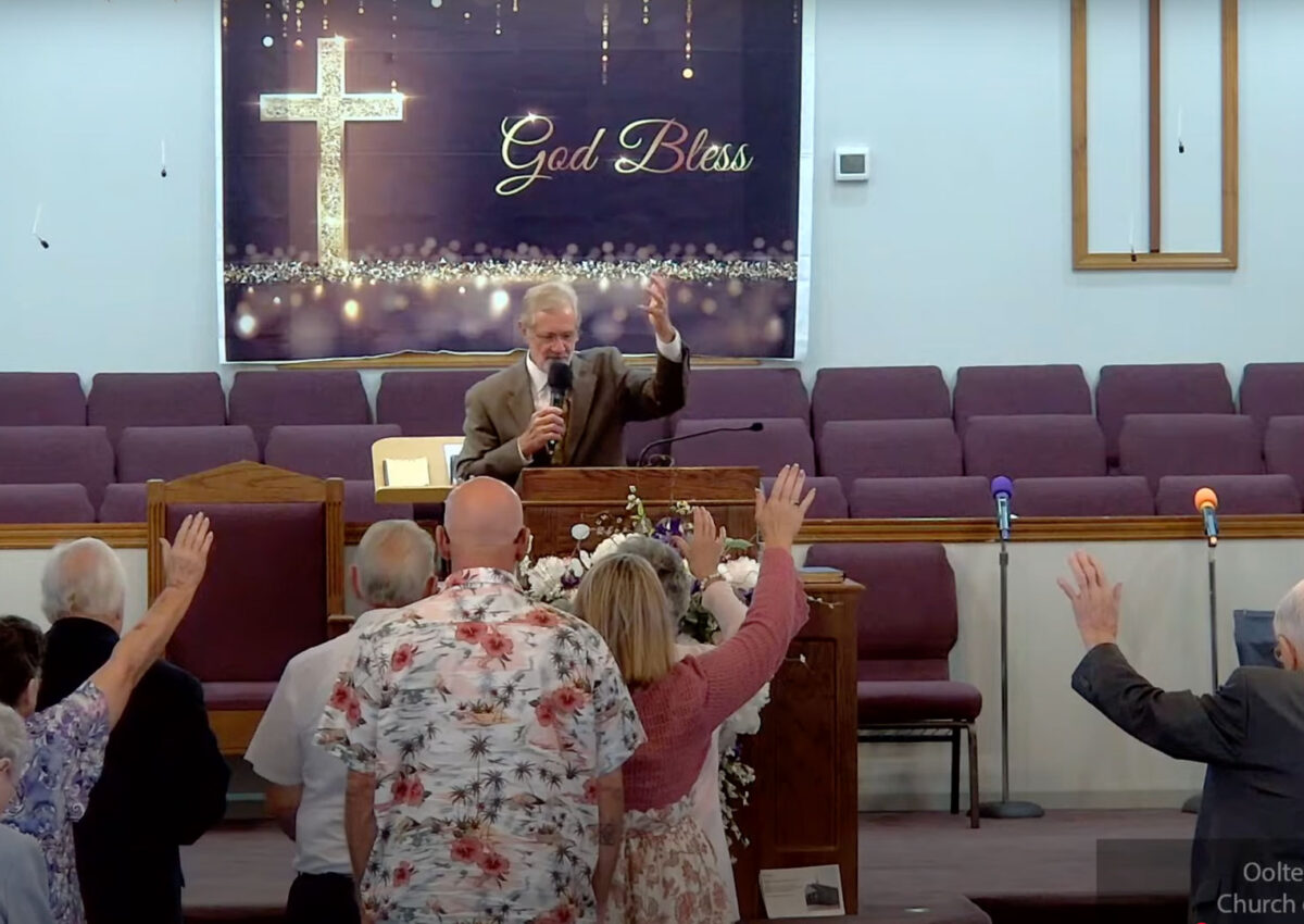 Darrell Bewley preaching.