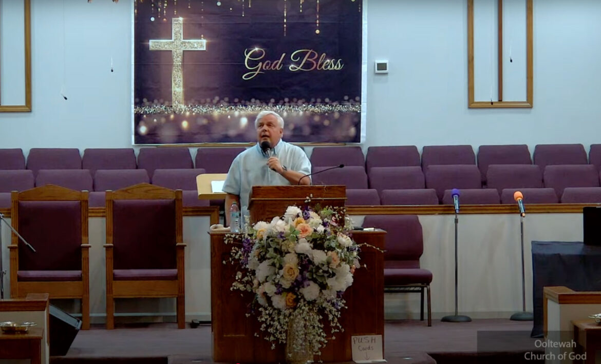Willard Griffin preaching.