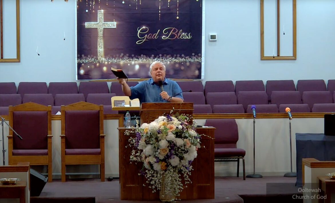 Willard Griffin preaching.