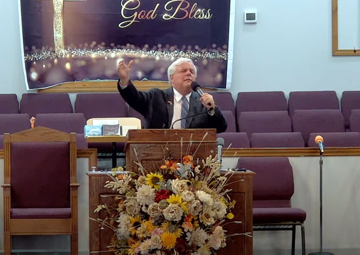Willard Griffin preaching.
