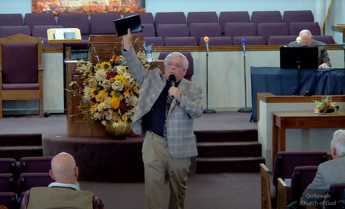 Willard Griffin preaching.