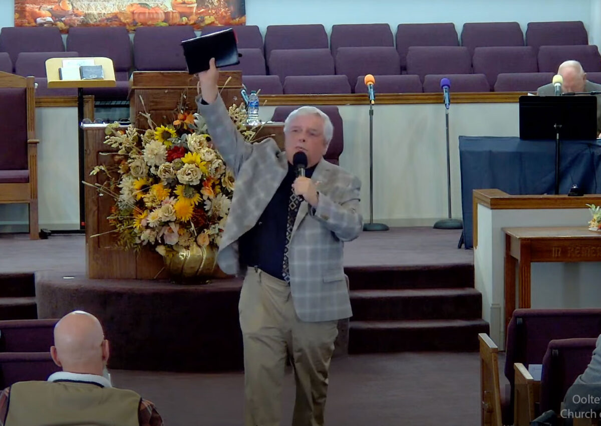 Willard Griffin preaching.
