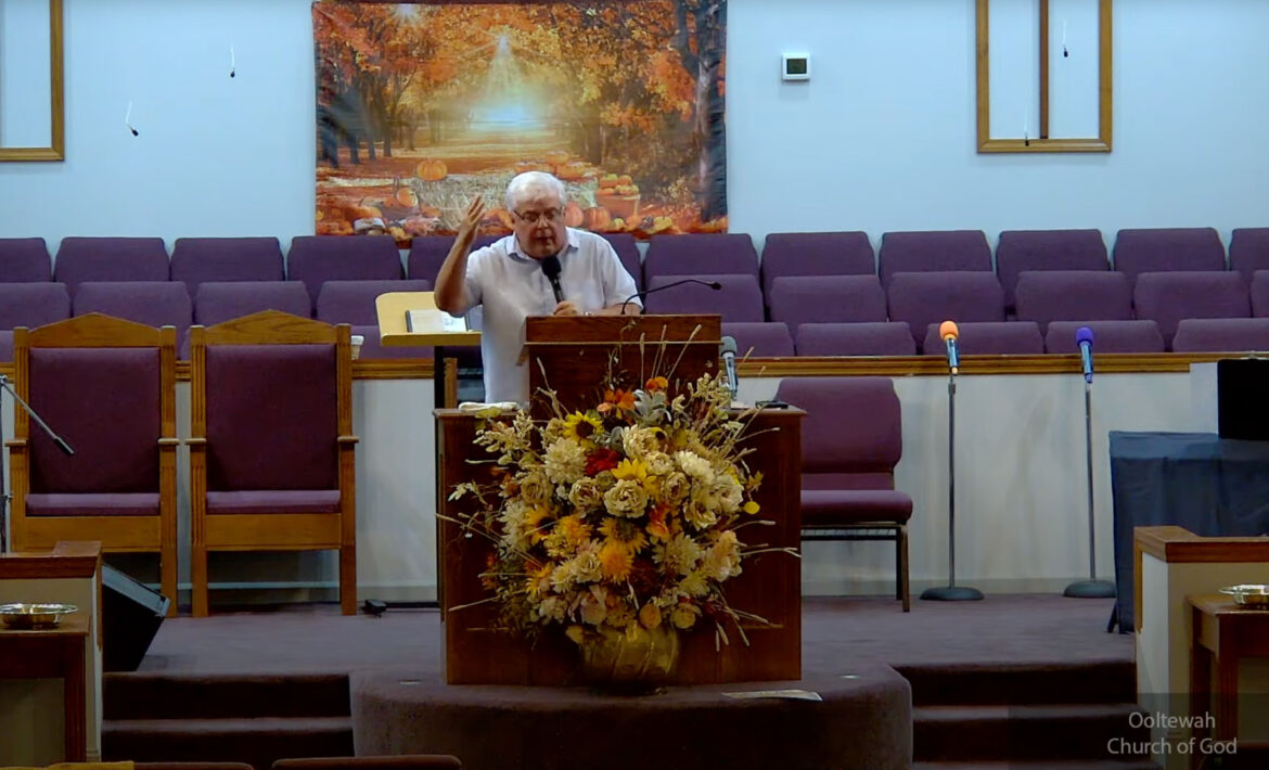 Willard Griffin preaching.