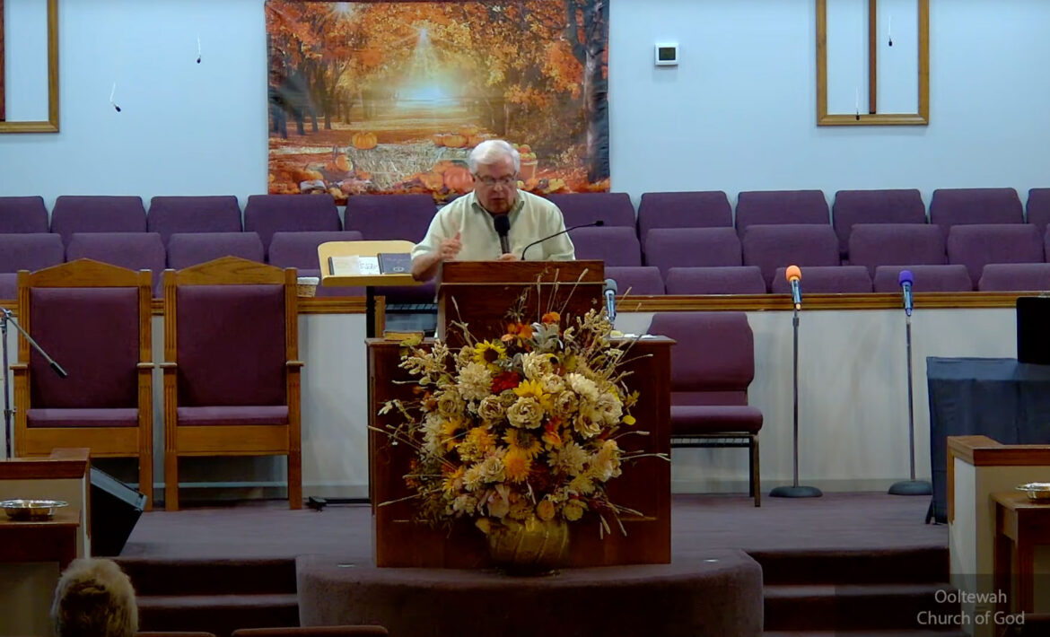 Willard Griffin preaching.