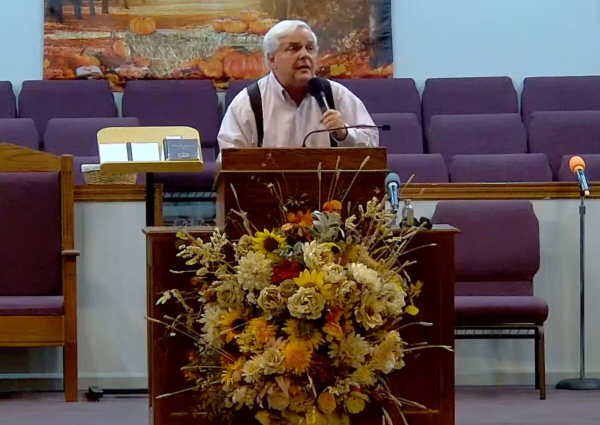 Willard Griffin preaching.