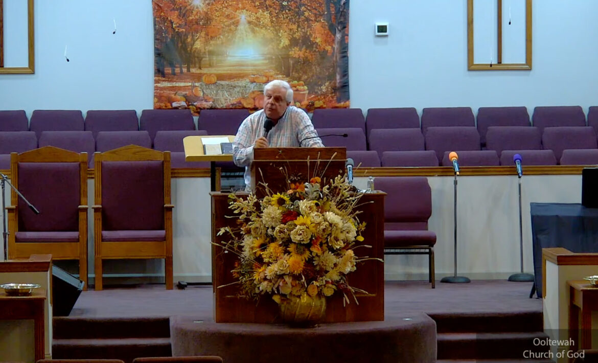 Willard Griffin preaching.