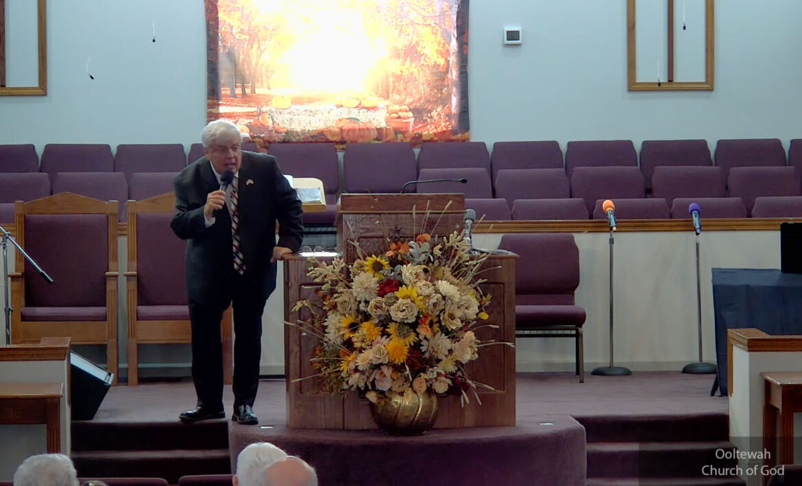 Willard Griffin preaching.