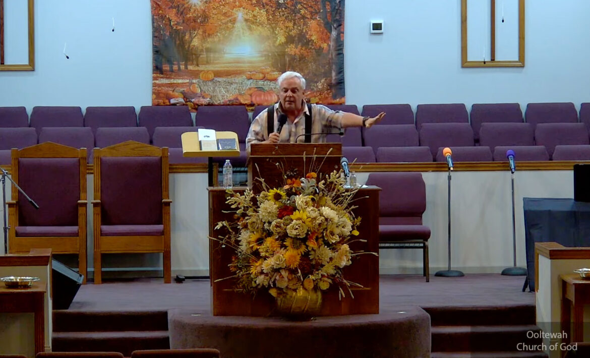 Willard Griffin preaching.