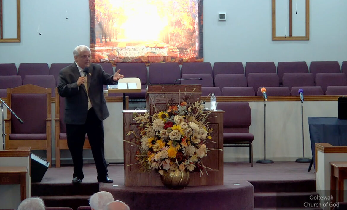 Willard Griffin preaching.