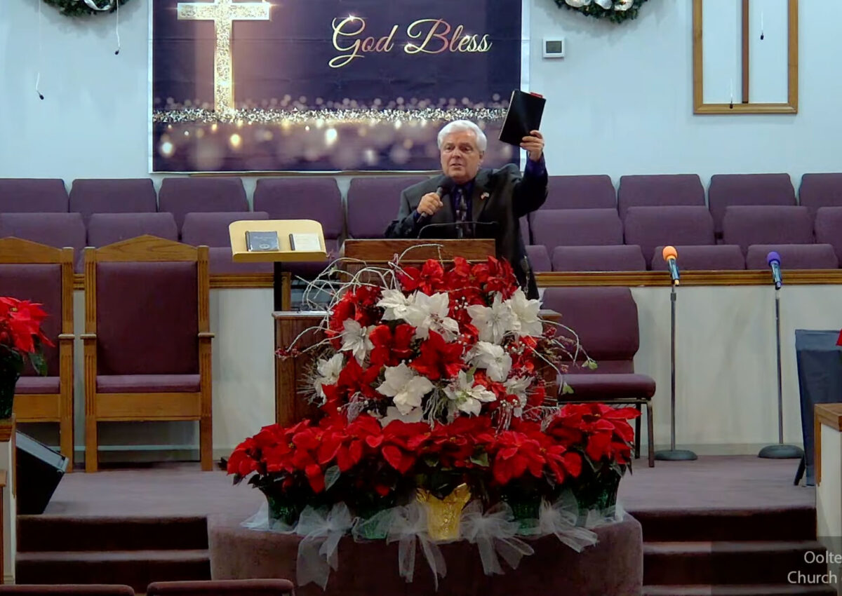 Willard Griffin preaching.