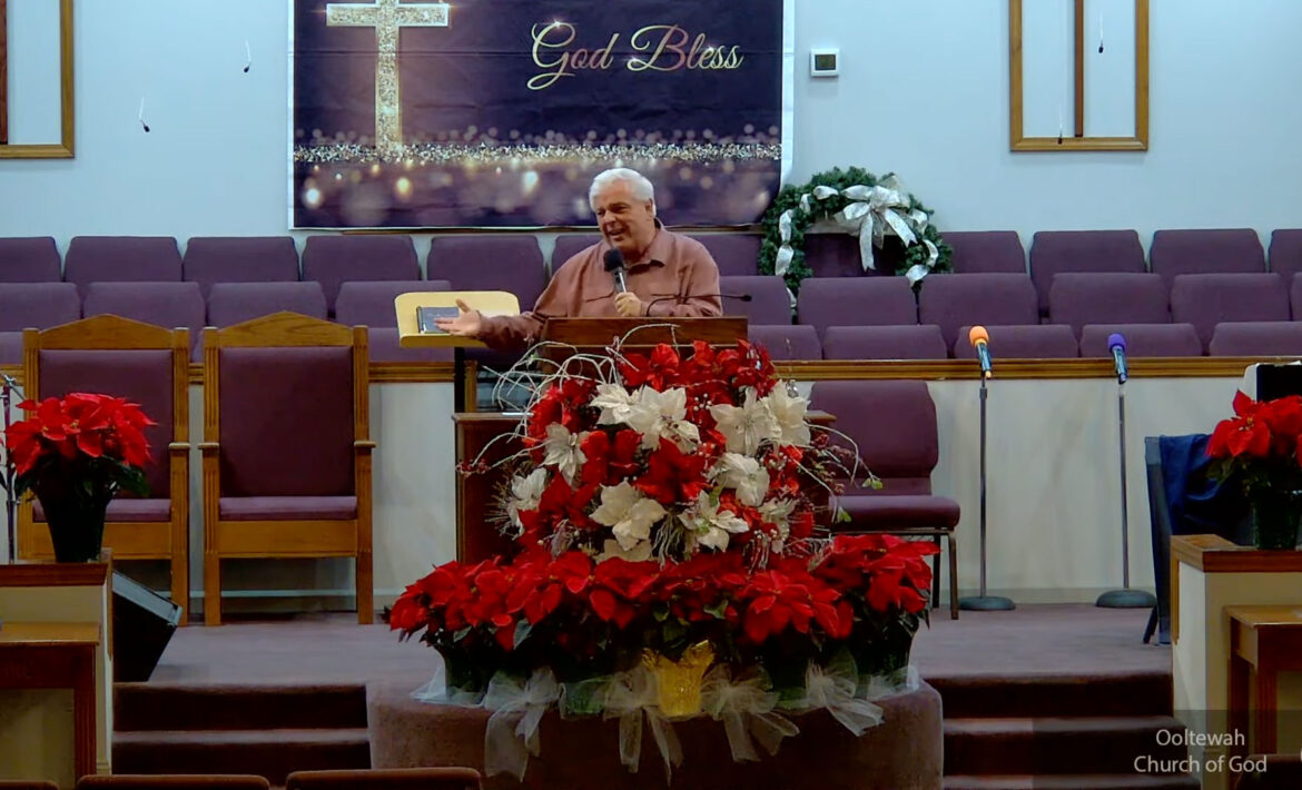 Willard Griffin preaching.