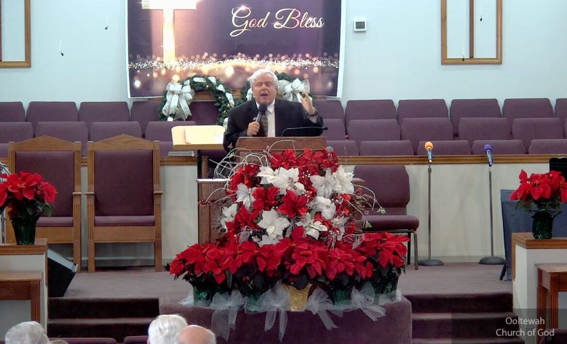 Willard Griffin preaching.