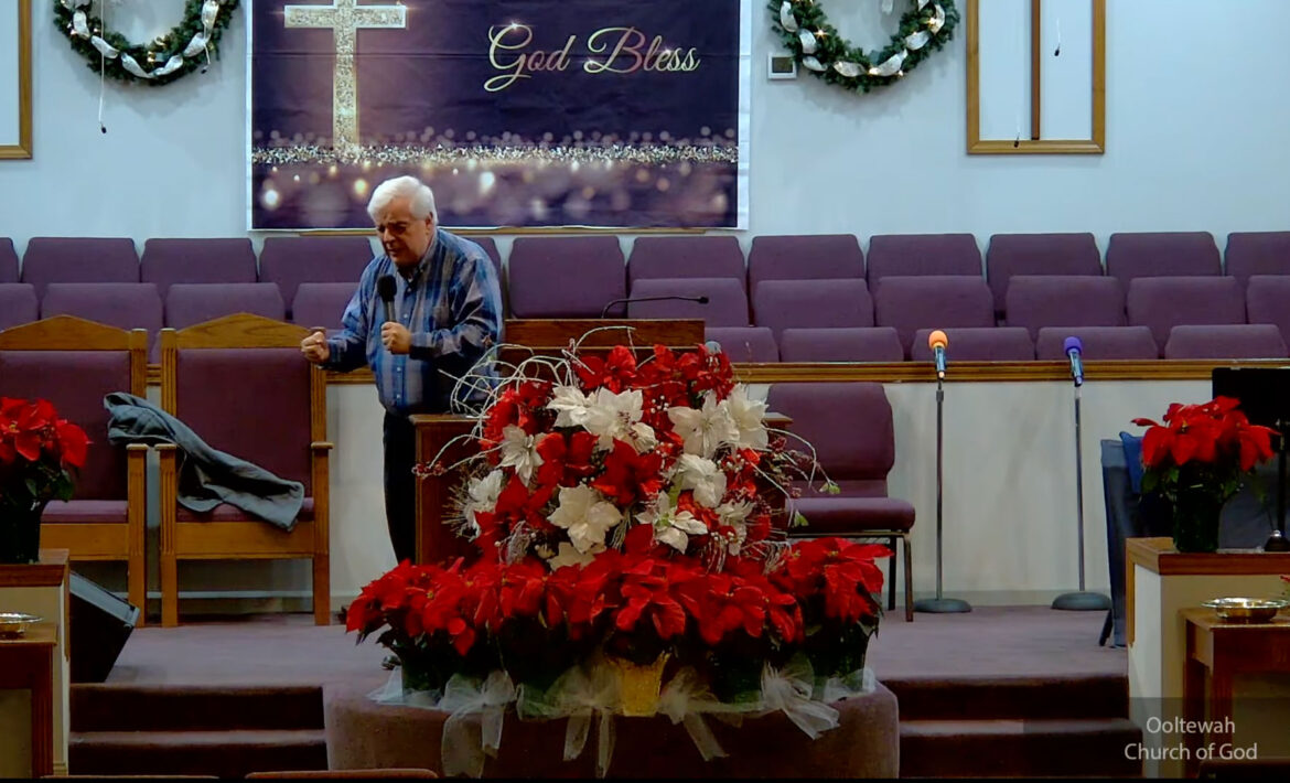 Willard Griffin preaching.