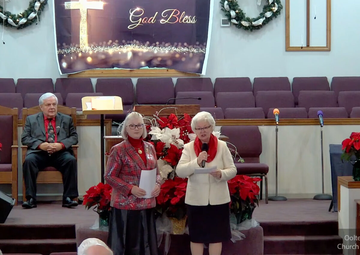 Willard Griffin preaching.