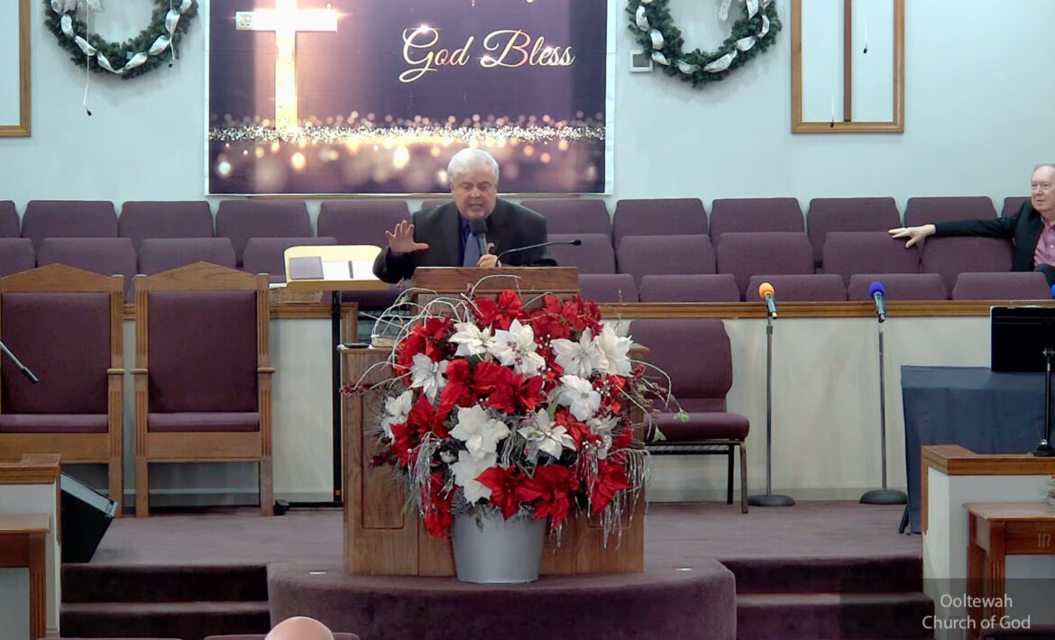 Willard Griffin preaching.