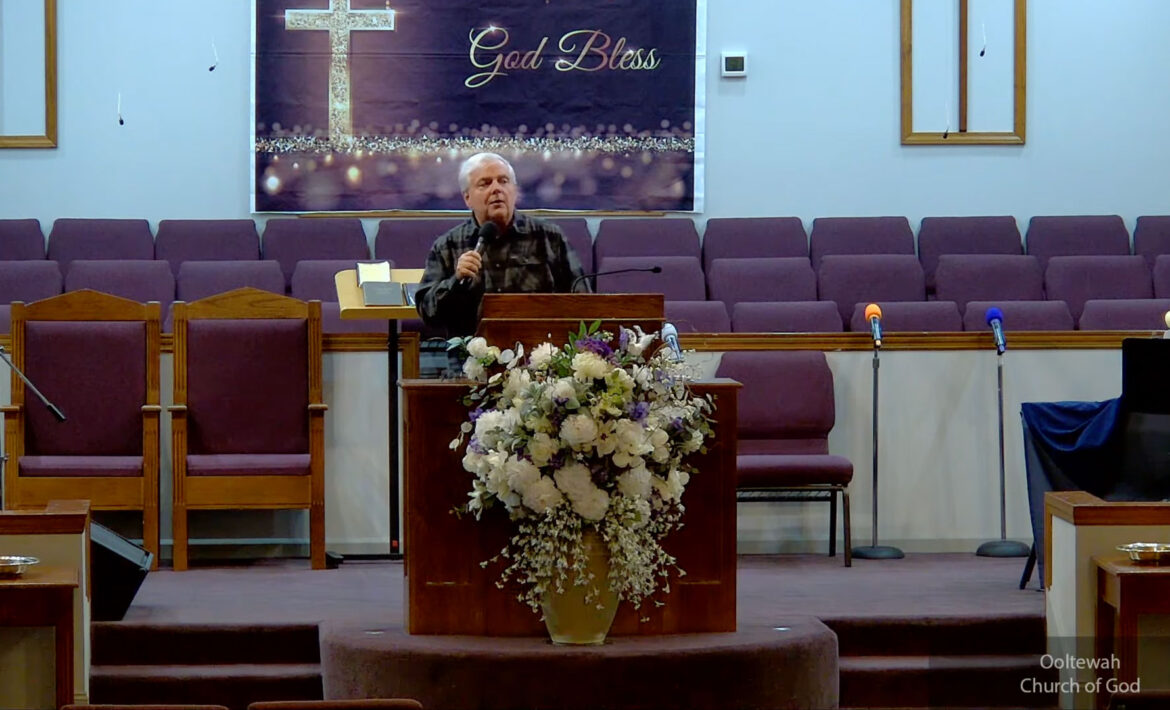 Willard Griffin preaching.