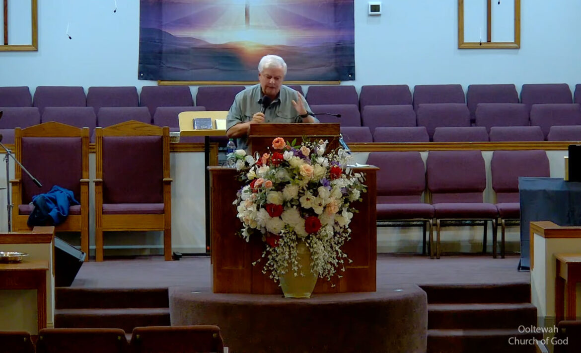 Willard Griffin preaching.