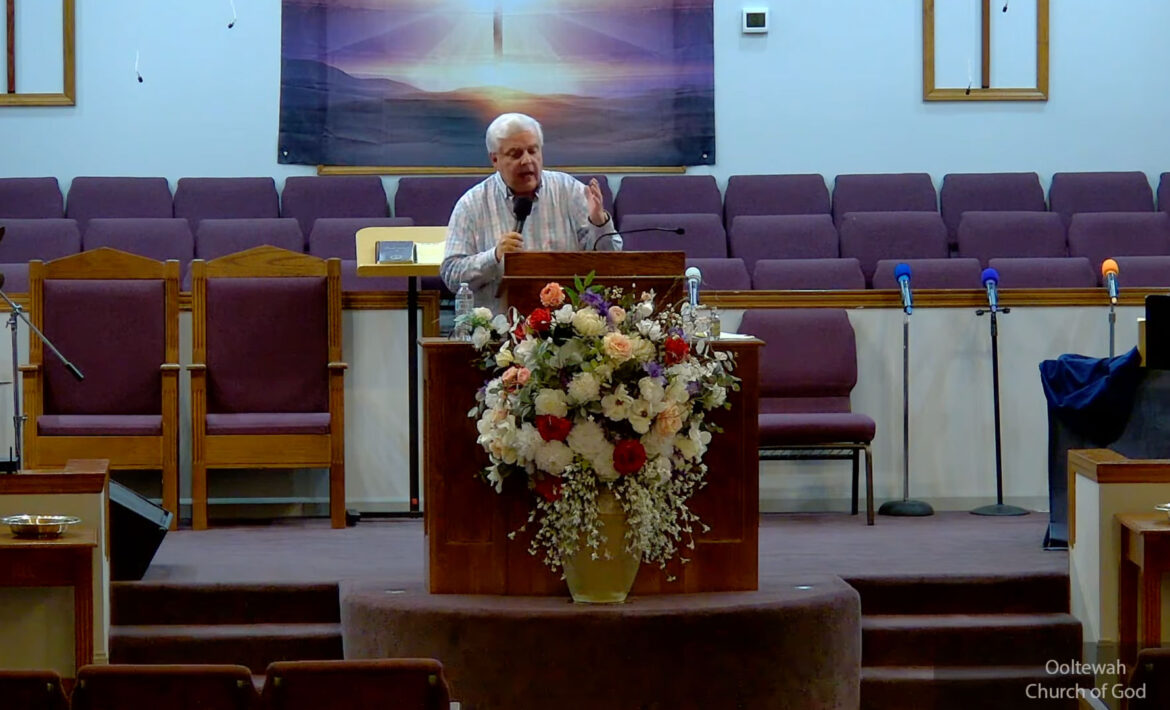 Willard Griffin preaching.