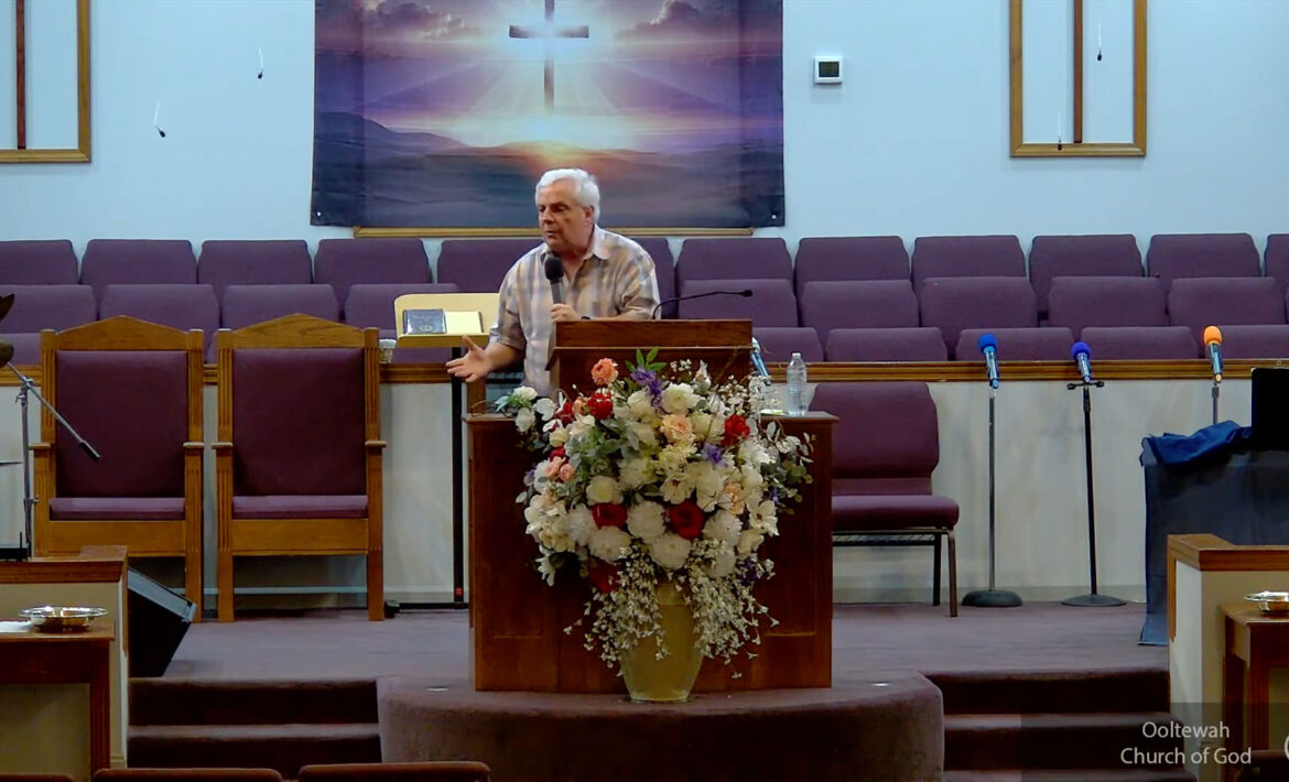 Willard Griffin preaching.