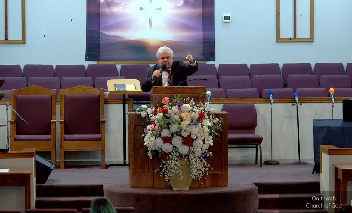 Willard Griffin preaching.