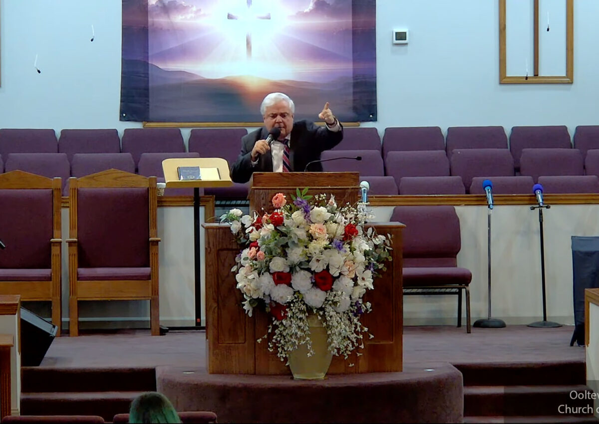 Willard Griffin preaching.