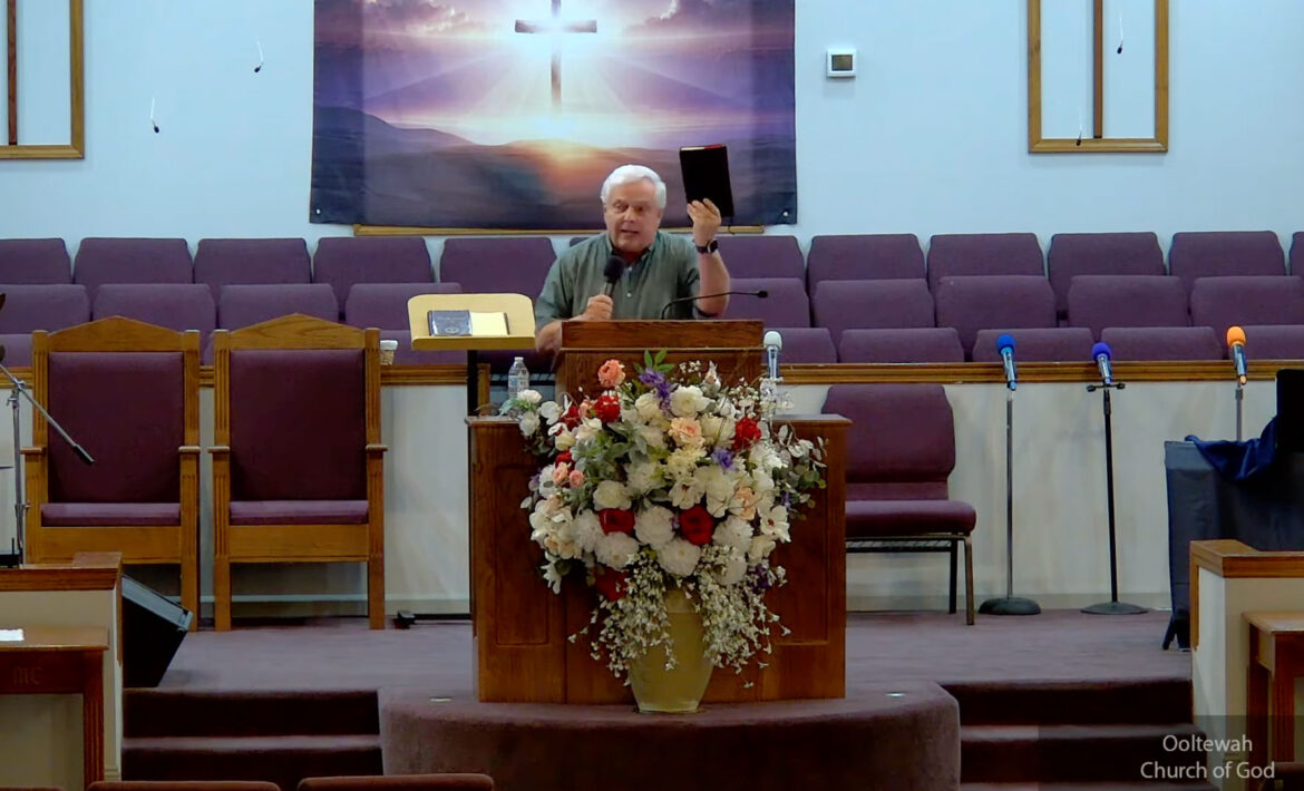 Willard Griffin preaching.