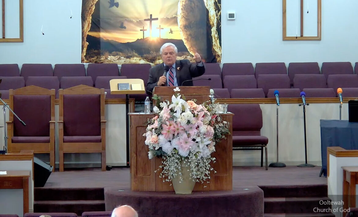 Willard Griffin preaching.