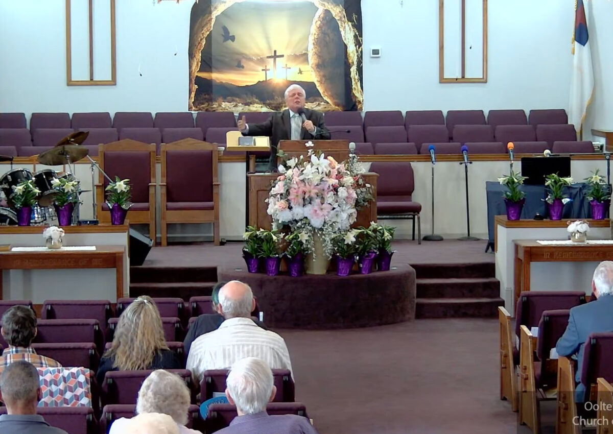 Willard Griffin preaching.