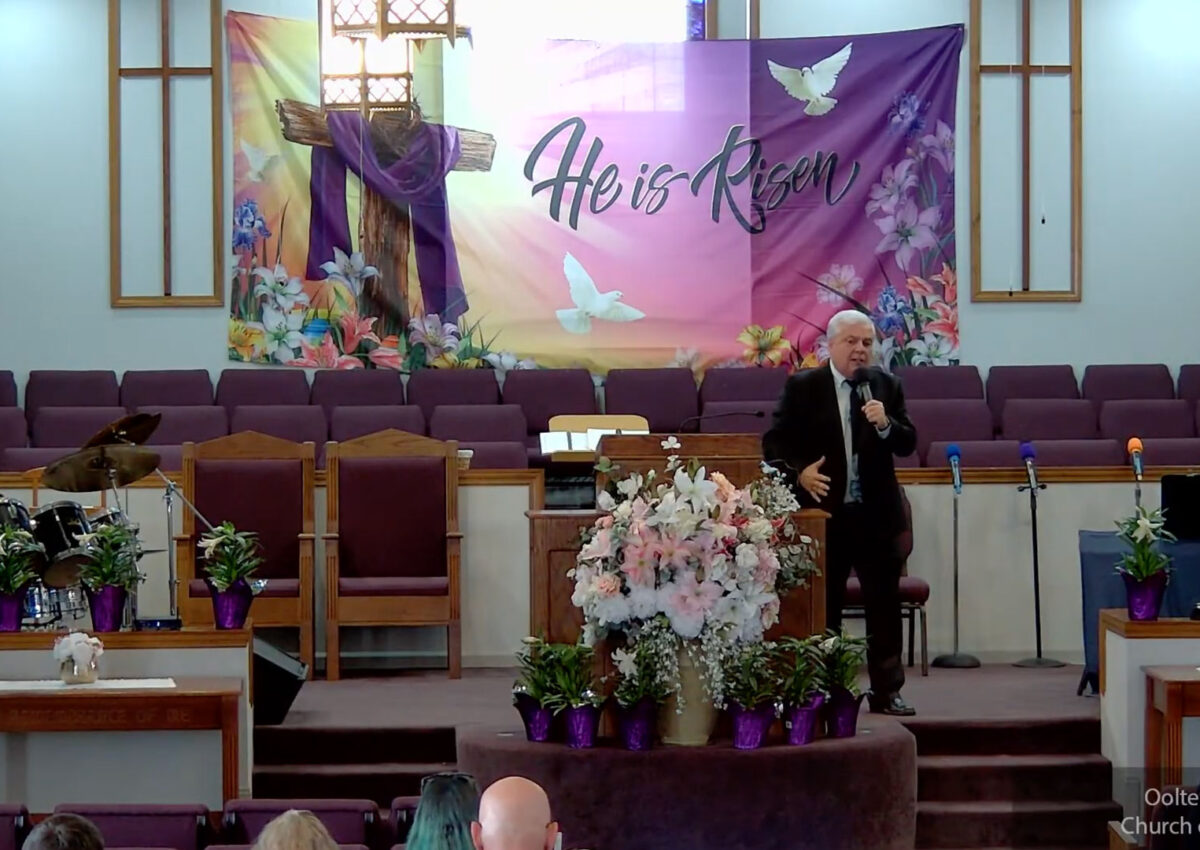 Willard Griffin preaching.