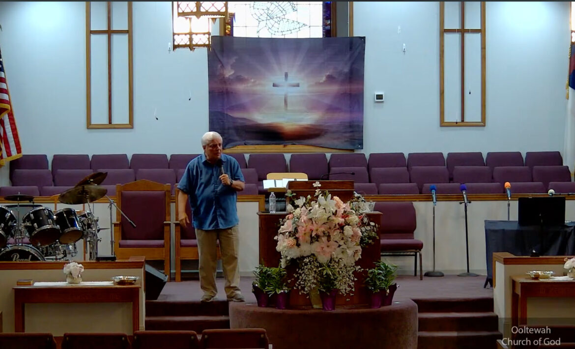 Willard Griffin preaching.