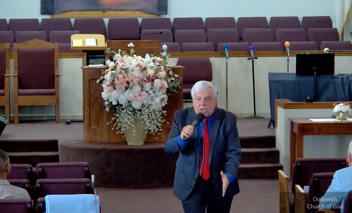 Willard Griffin preaching.