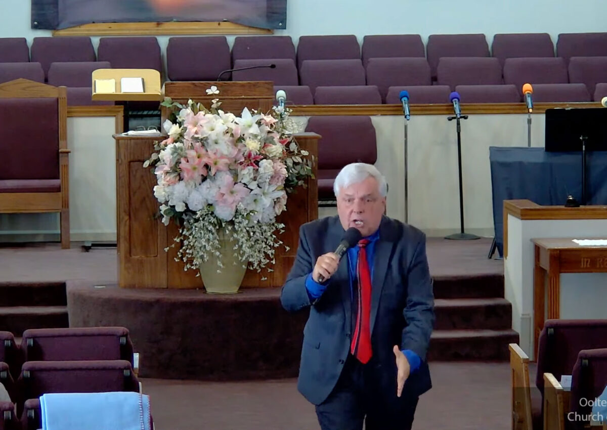 Willard Griffin preaching.