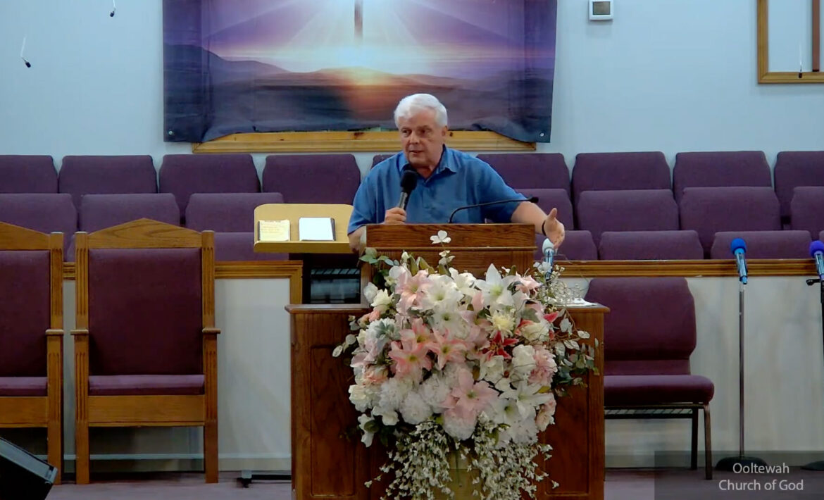 Willard Griffin preaching.