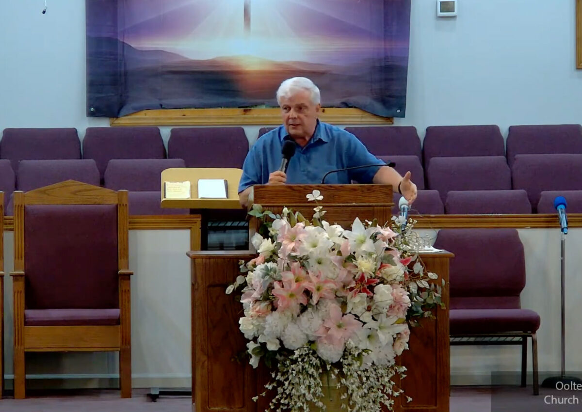 Willard Griffin preaching.