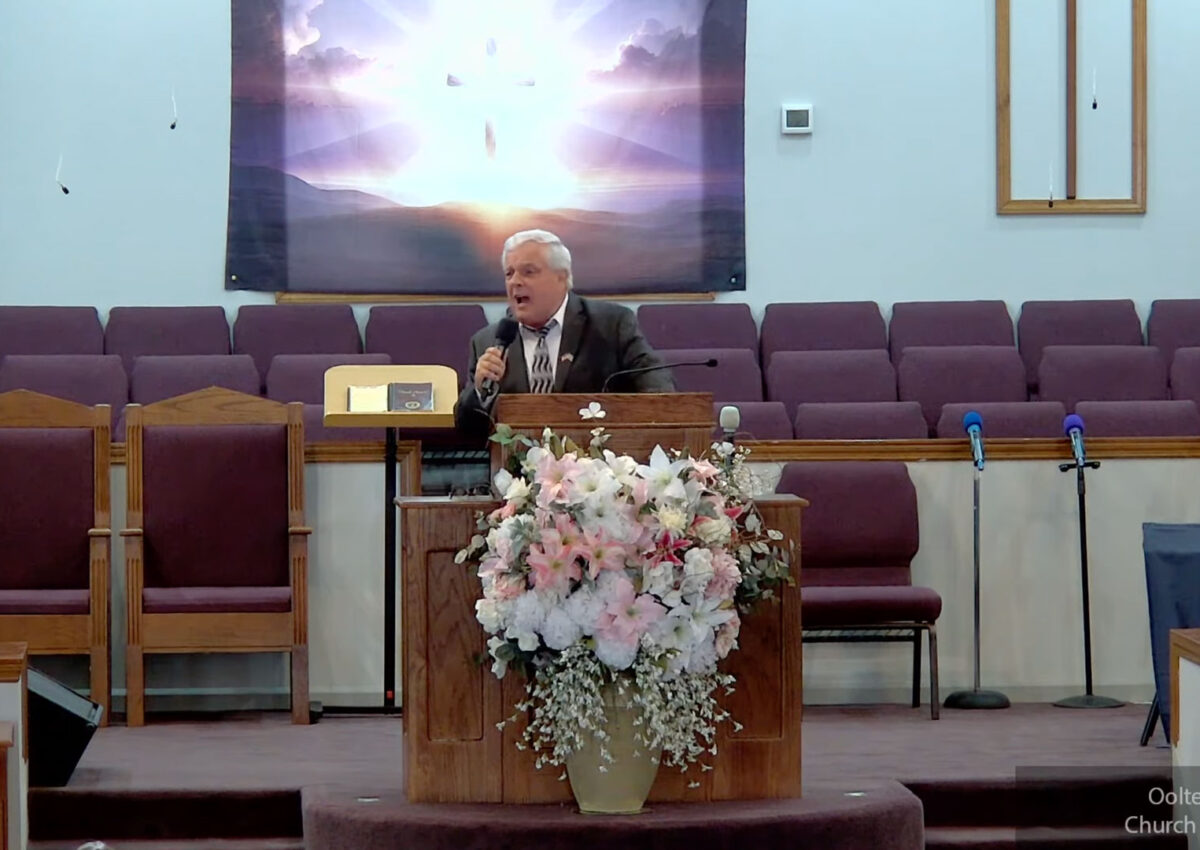 Willard Griffin preaching.