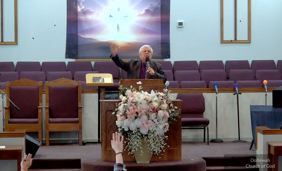 Willard Griffin preaching.