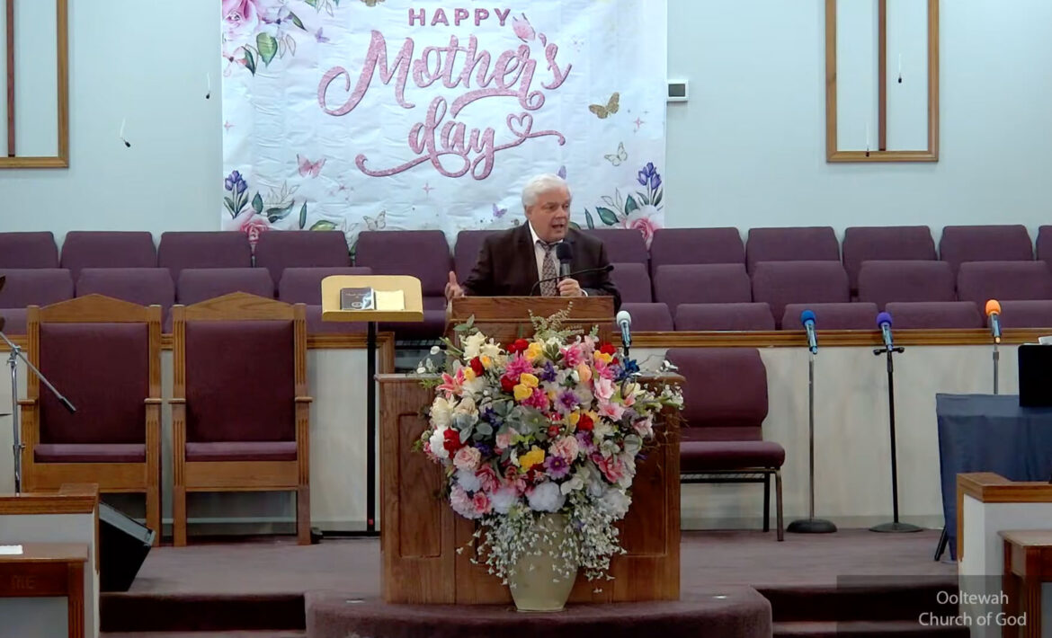 Willard Griffin preaching.