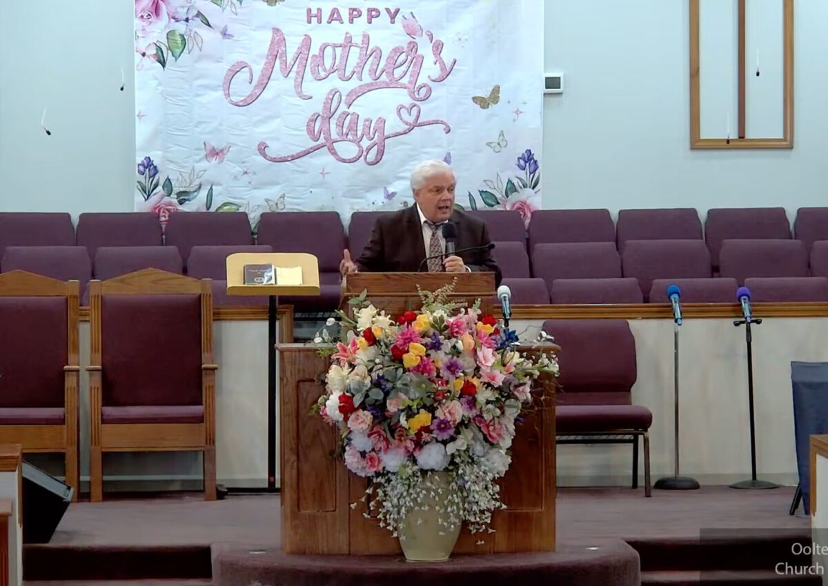 Willard Griffin preaching.