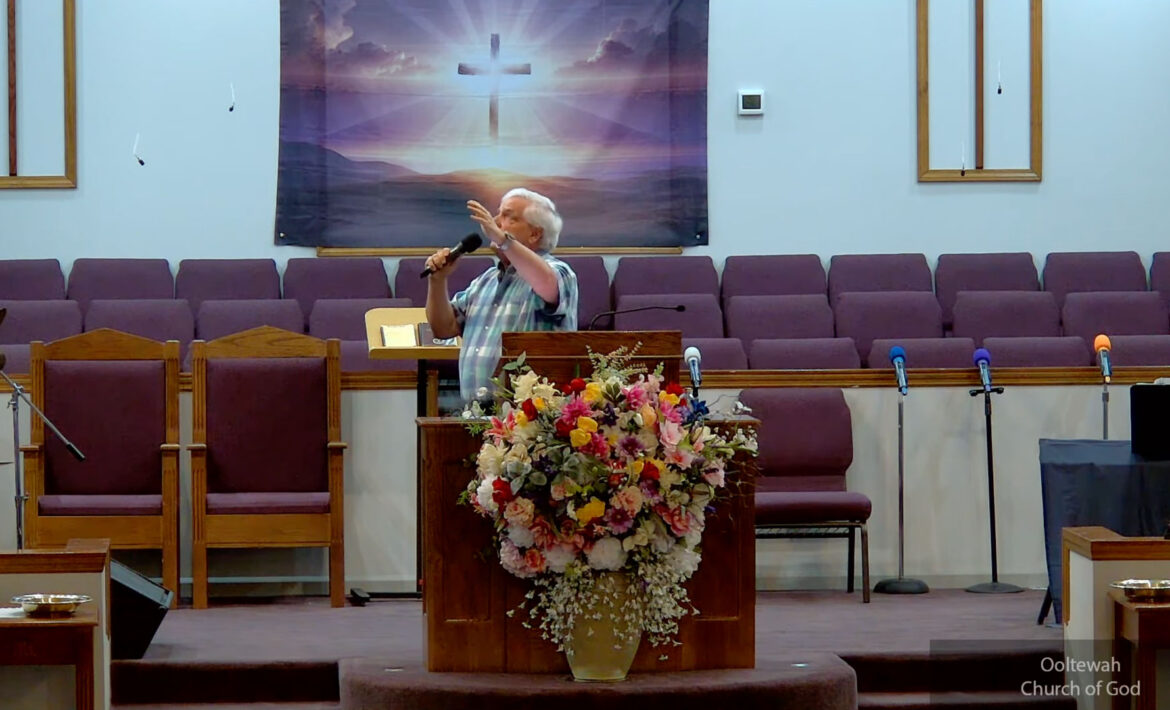Willard Griffin preaching.
