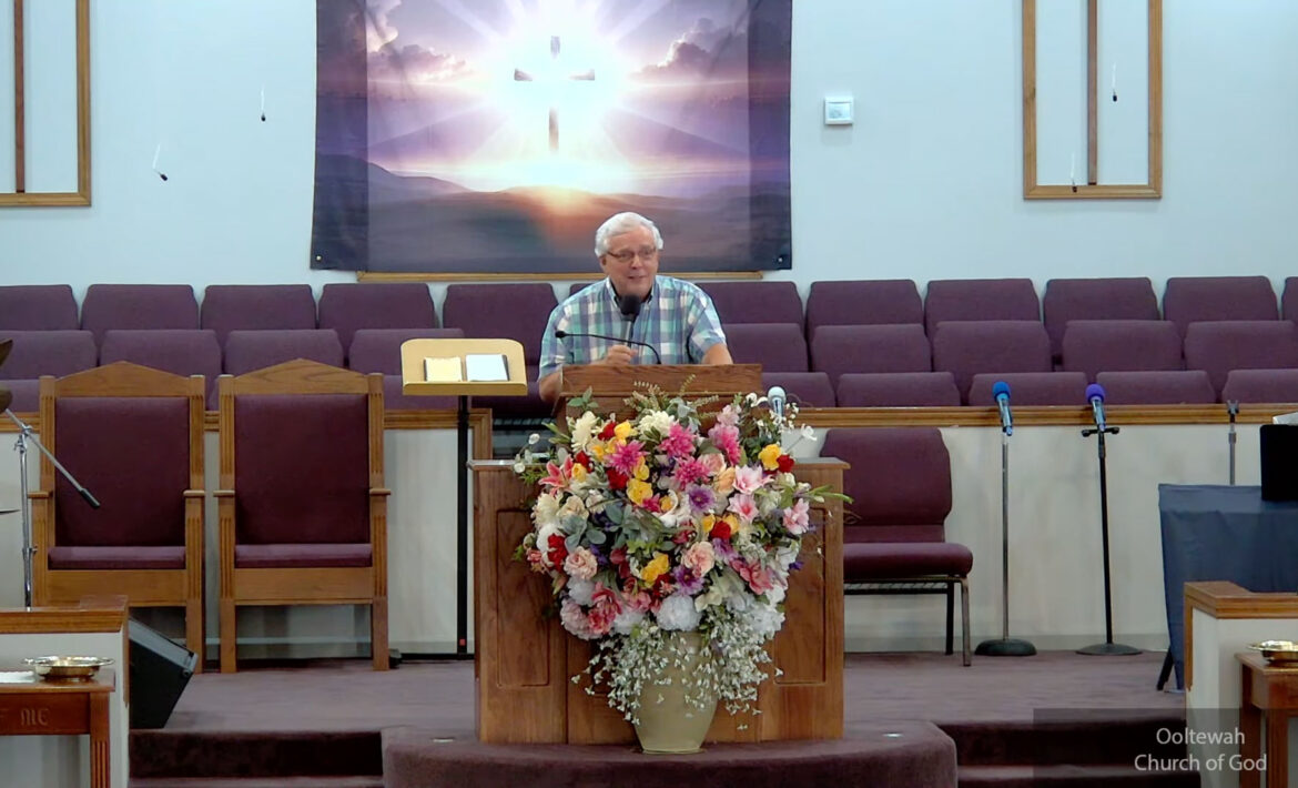 Willard Griffin preaching.